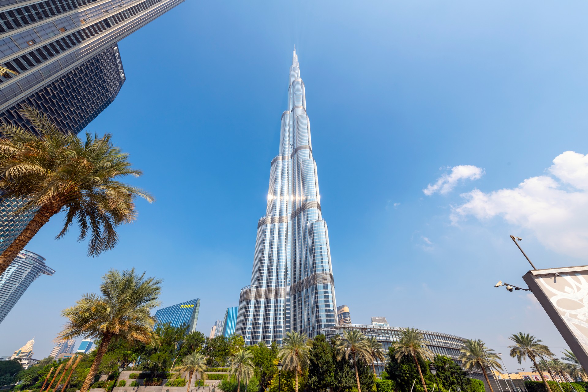 Low angle view of the Burj Khalifa skyscraper, the tallest building in the world, in the commercial downtown district of Dubai, United Arab Emirates.